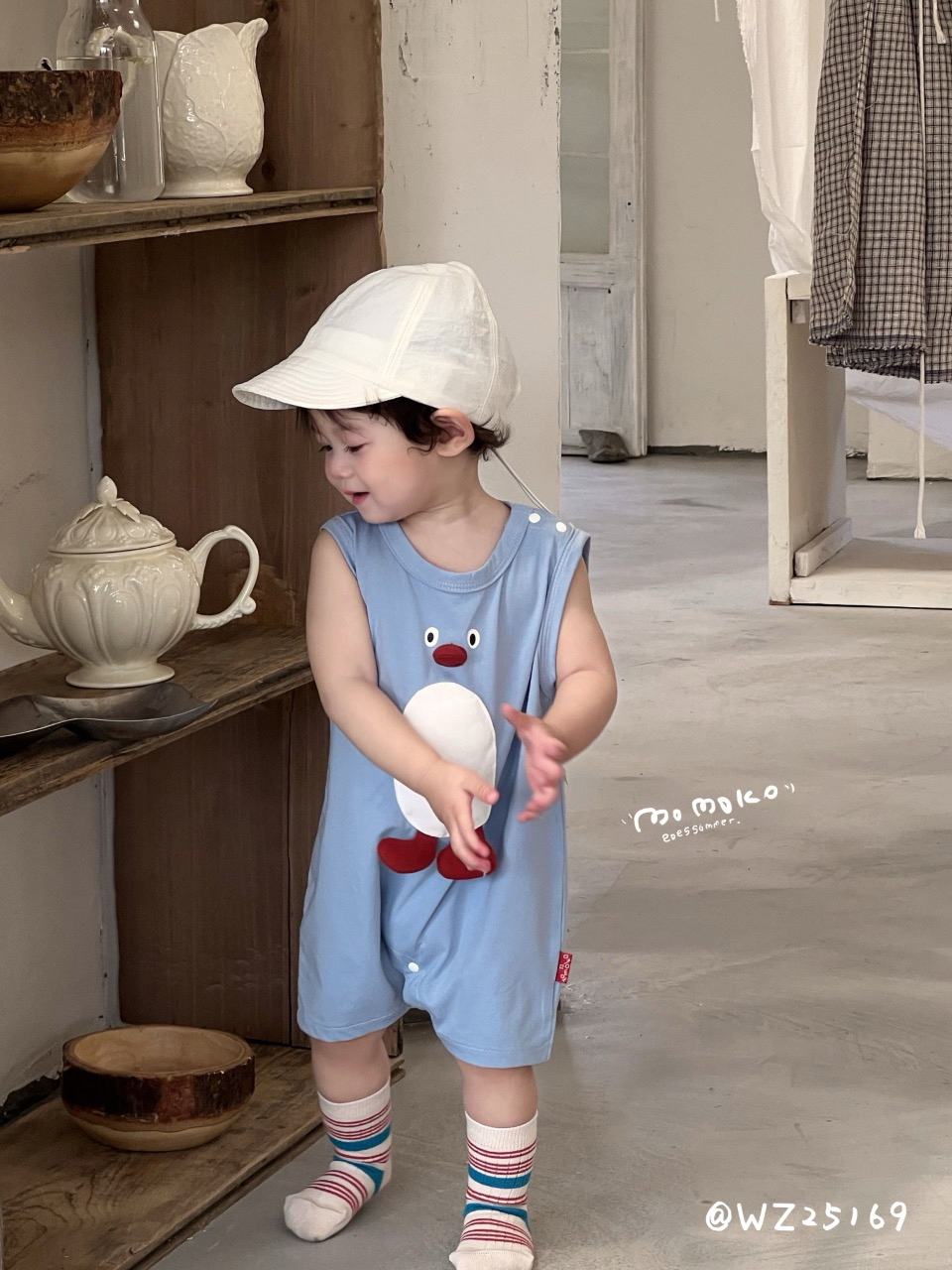 丸纸蓝色企鹅连体爬服