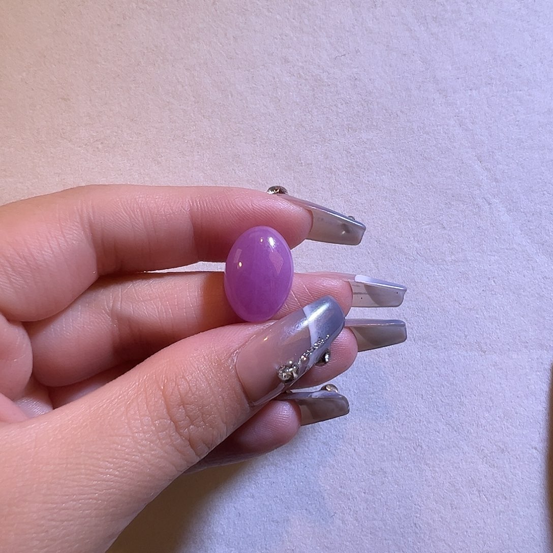 遇***莹单珠未镶嵌锂辉石毕业级别紫锂辉椭圆蛋面