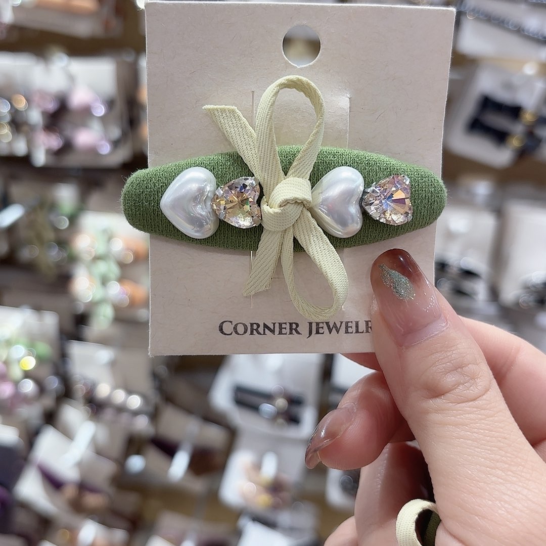 荼***m皮质铁合金椭圆蝴蝶结