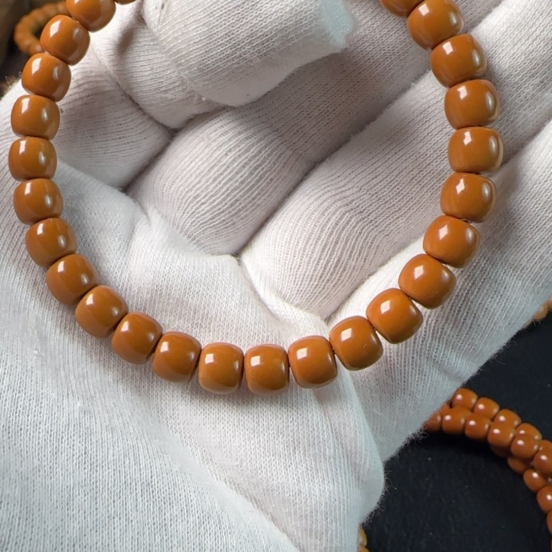 王***达橄榄核手串老挝核尖单圈7.3mm全品三花料