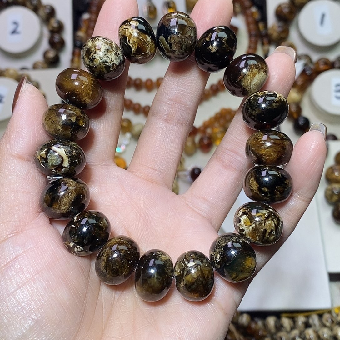 &****琥珀未镶嵌裸石熊猫花15+