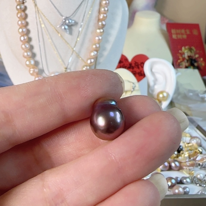 淡水珍珠圆巴有生长纹裸珠未镶嵌火****?