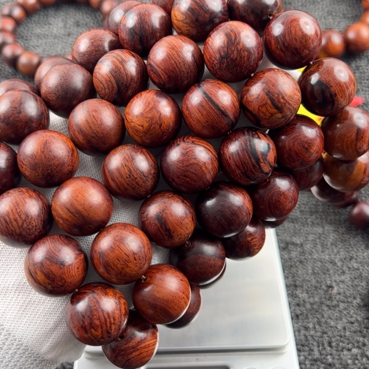 故***情木海南红降黑金20的7串