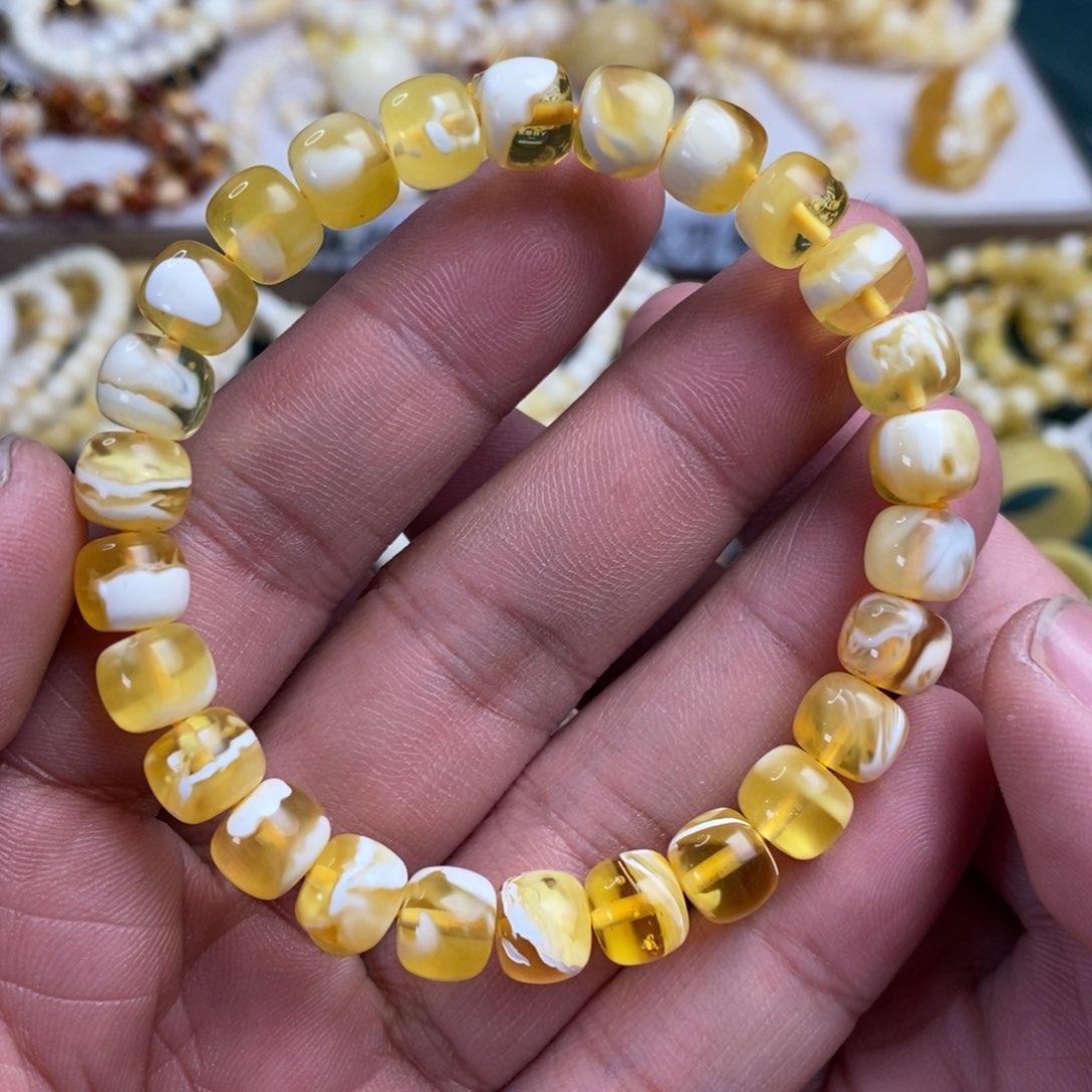 琥珀裸石未镶嵌8.8mm金瓷白溶洞老型