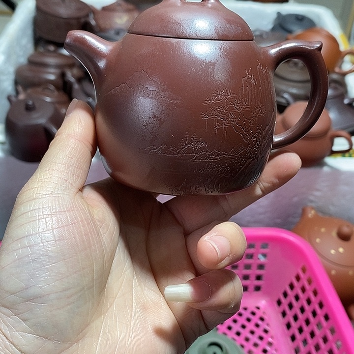 紫砂茶壶微瑕微笑