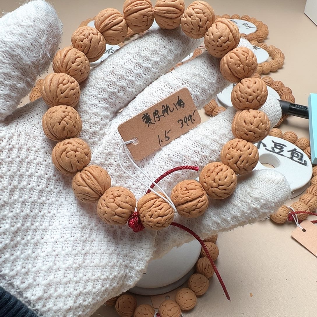 G***s手串桃核1.5黄皮肌肉