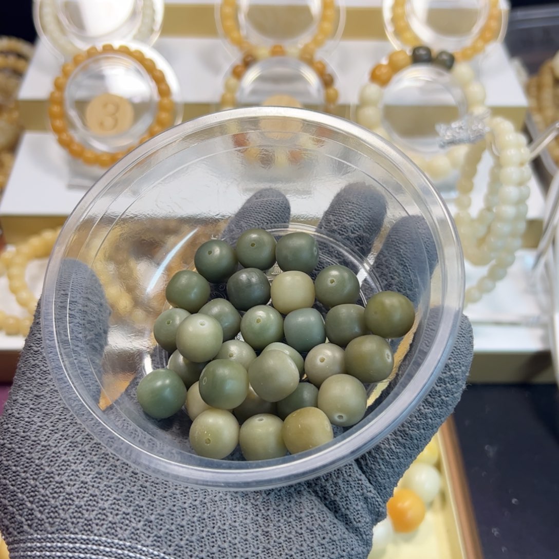 长***叟菩提根/象牙果吊坠14×13阴皮绿手持27颗