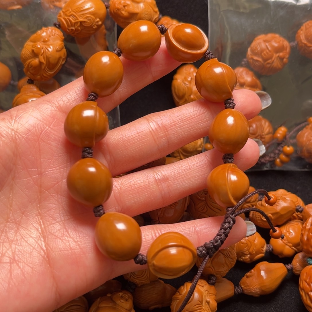 用***9橄榄核手串元宝串