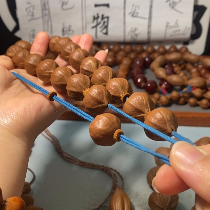 秋***雨手串橄榄核0291精品蒜头铁核18+1颗