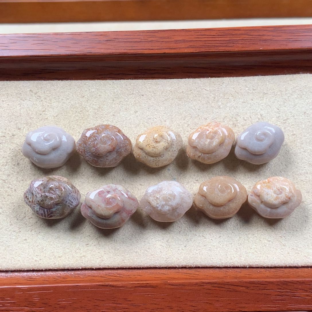 未镶嵌如意一组漏100米。15硅化珊瑚（珊瑚玉）