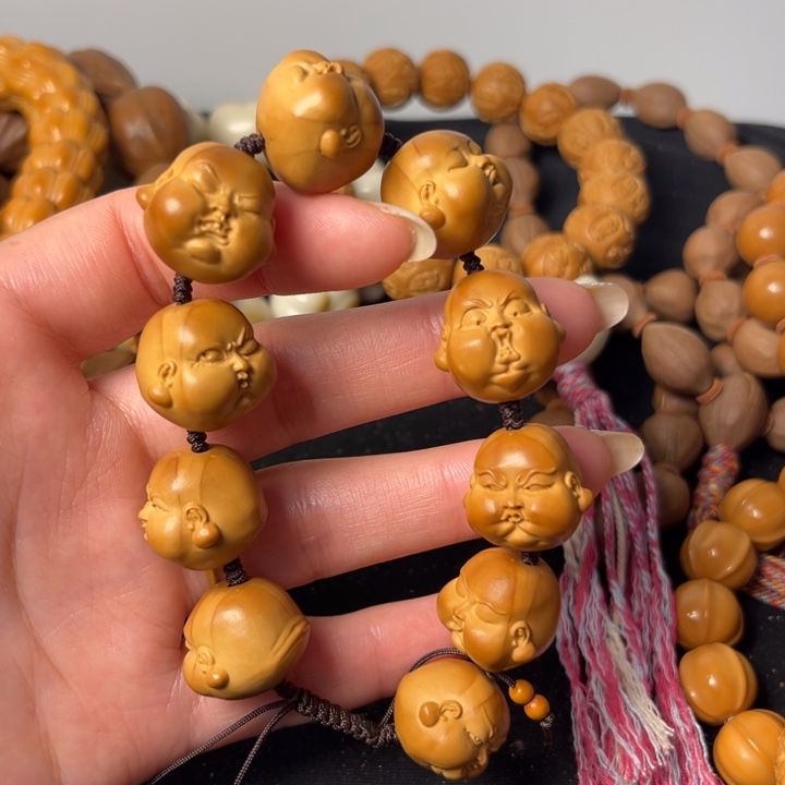 手串橄榄核人生百态