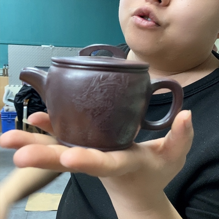 紫砂茶壶的的的人