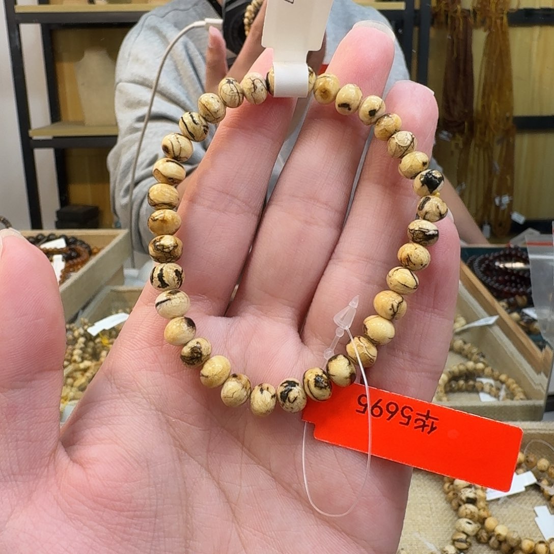 阳***合琥珀未镶嵌裸石抚顺琥珀白花6mm