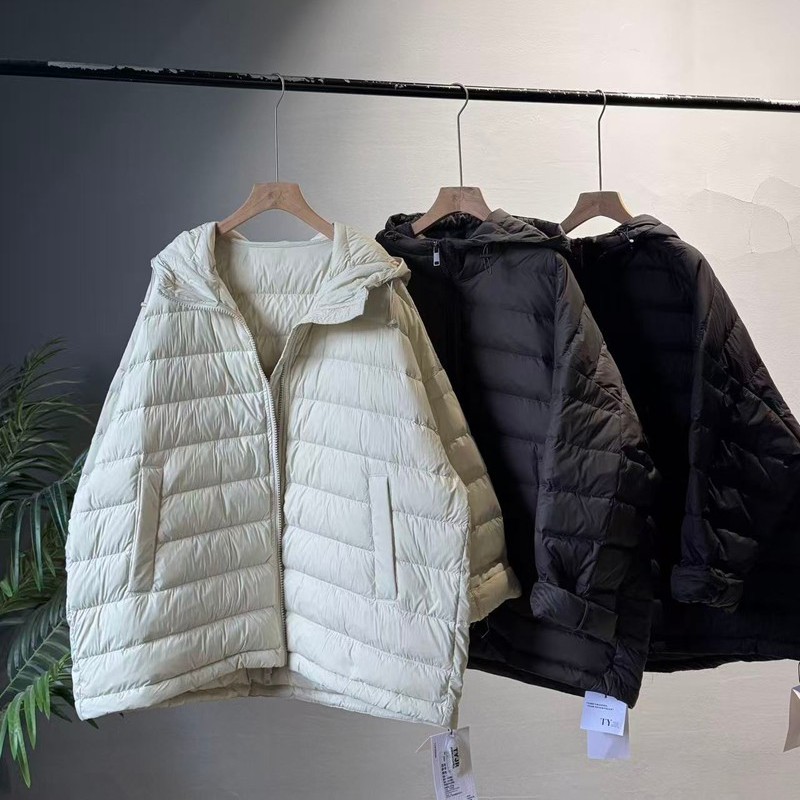 55816排骨羽绒女款服中长款大码韩版休闲宽松简约高级2025冬季新