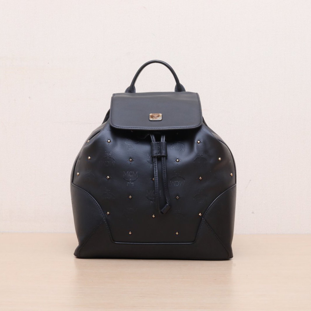95新 MCM 小花攀攀 黑色 皮革C 帆布 mcm 抽绳双肩包 