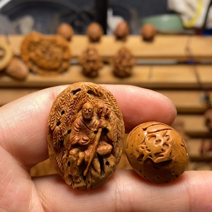 用***)桃核手工雕刻静思罗汉单颗