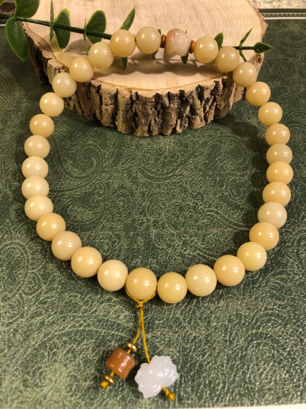 88奶黄白玉菩提双圈手持佩醒狮男女款文玩