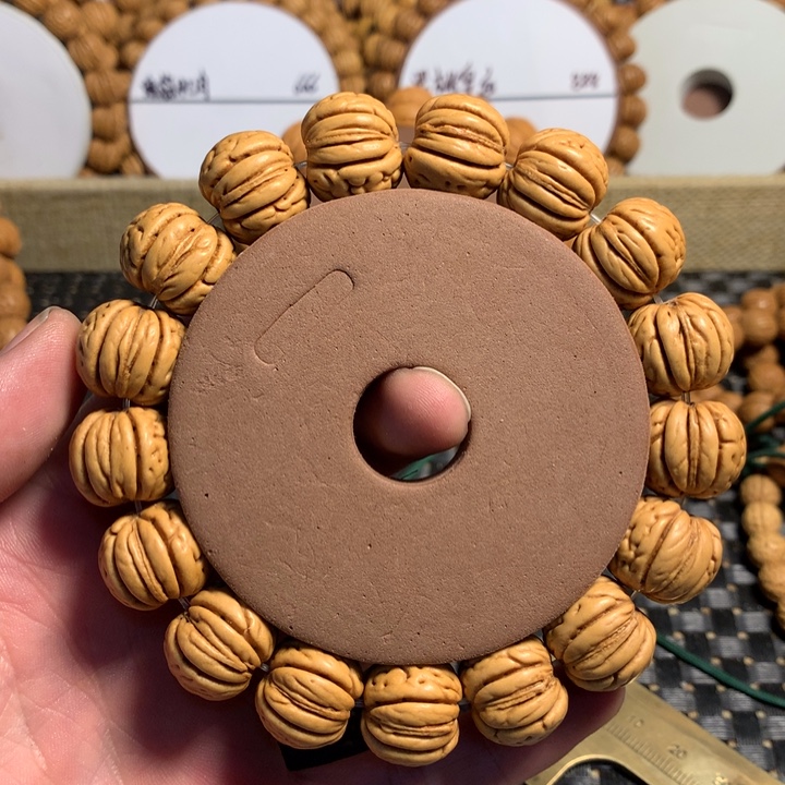 子***。桃核手串5#宽脐金丹