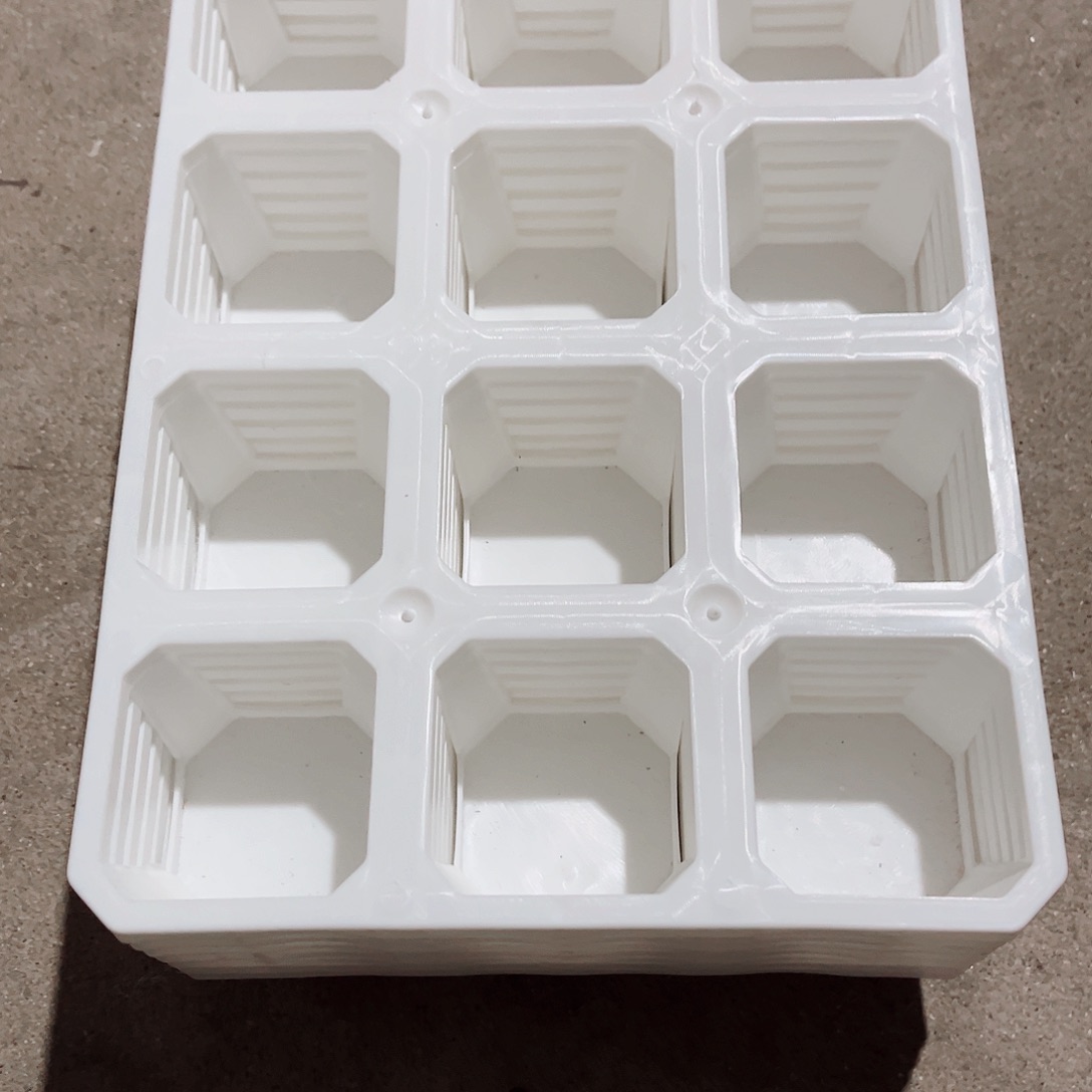 塑料瑕疵拖架12孔白色7个