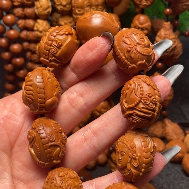 橄榄核吊坠八宝观音