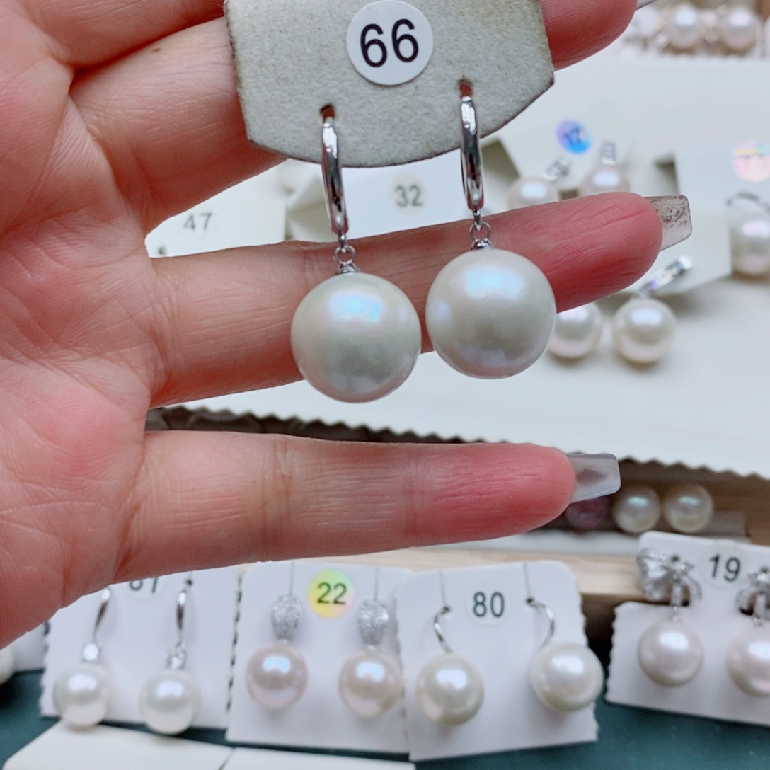 爱***…银S925镶嵌耳饰淡水珍珠