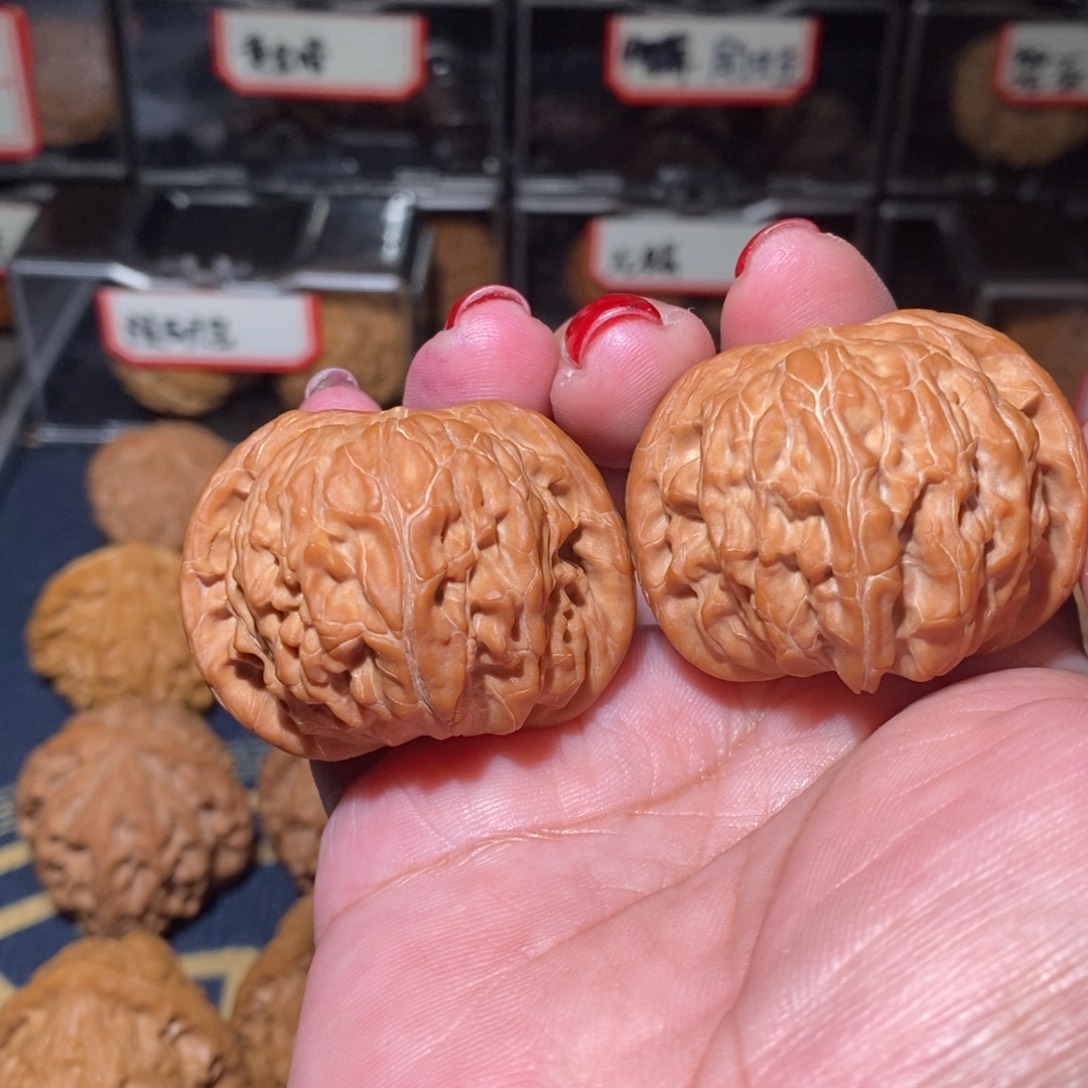 串***店文玩核桃把件磨盘
