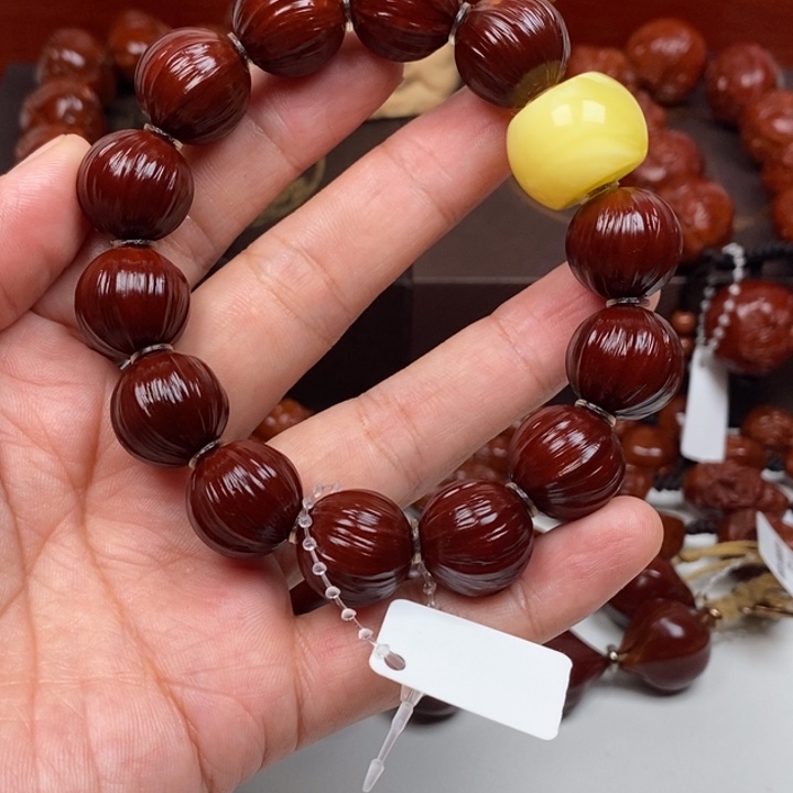 橄榄核吊坠我****乐8887776666