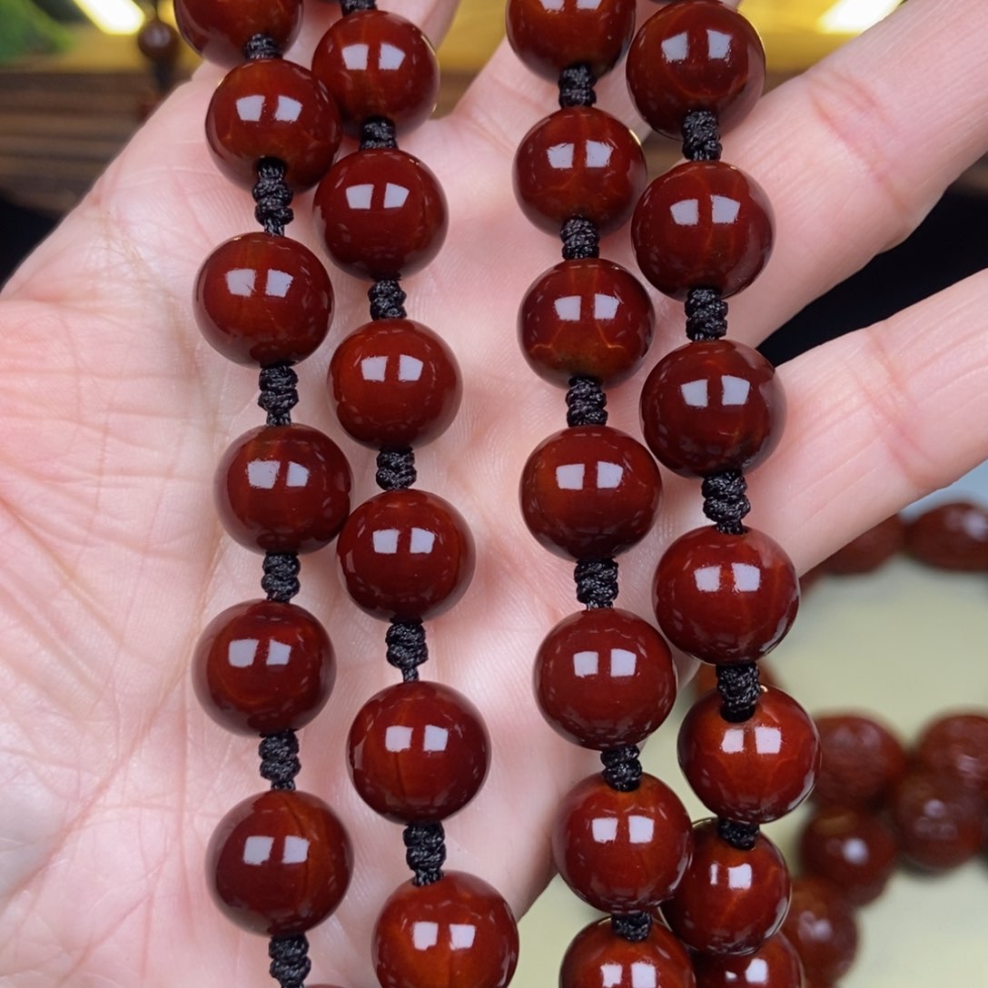 橄榄核吊坠赶****家光珠脖挂