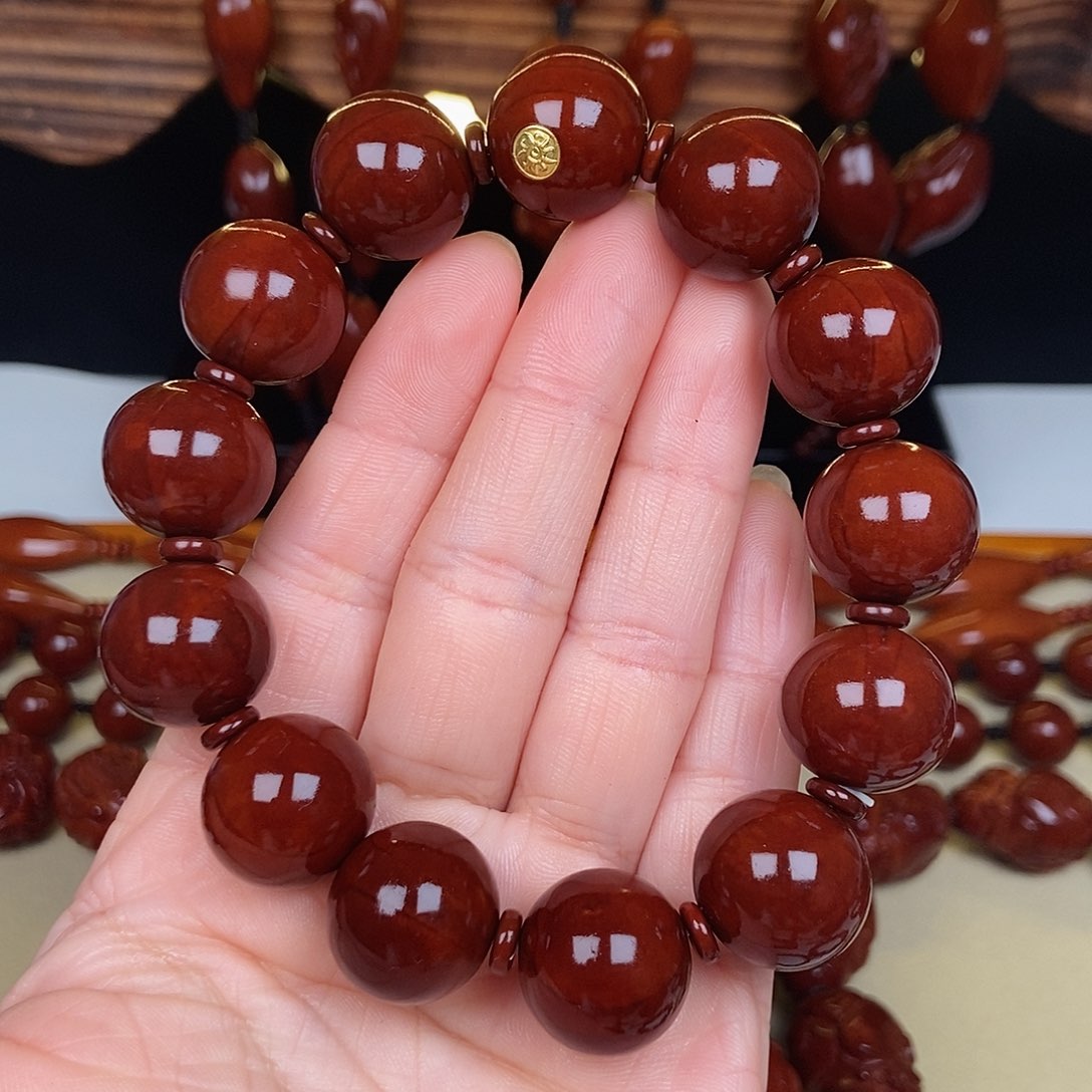 橄榄核吊坠纠*了正圆光珠