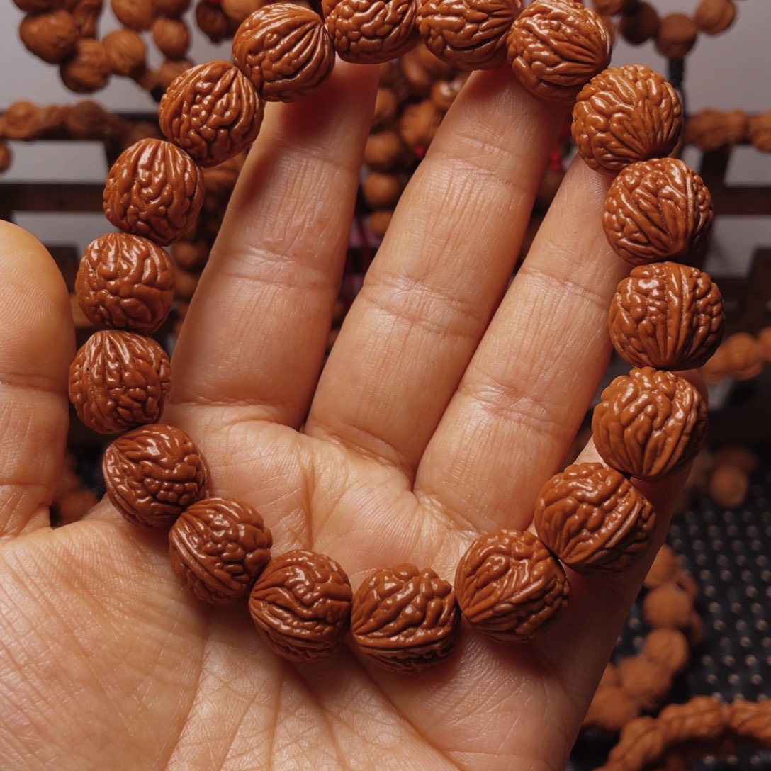 木质类龙纹桃枭手串