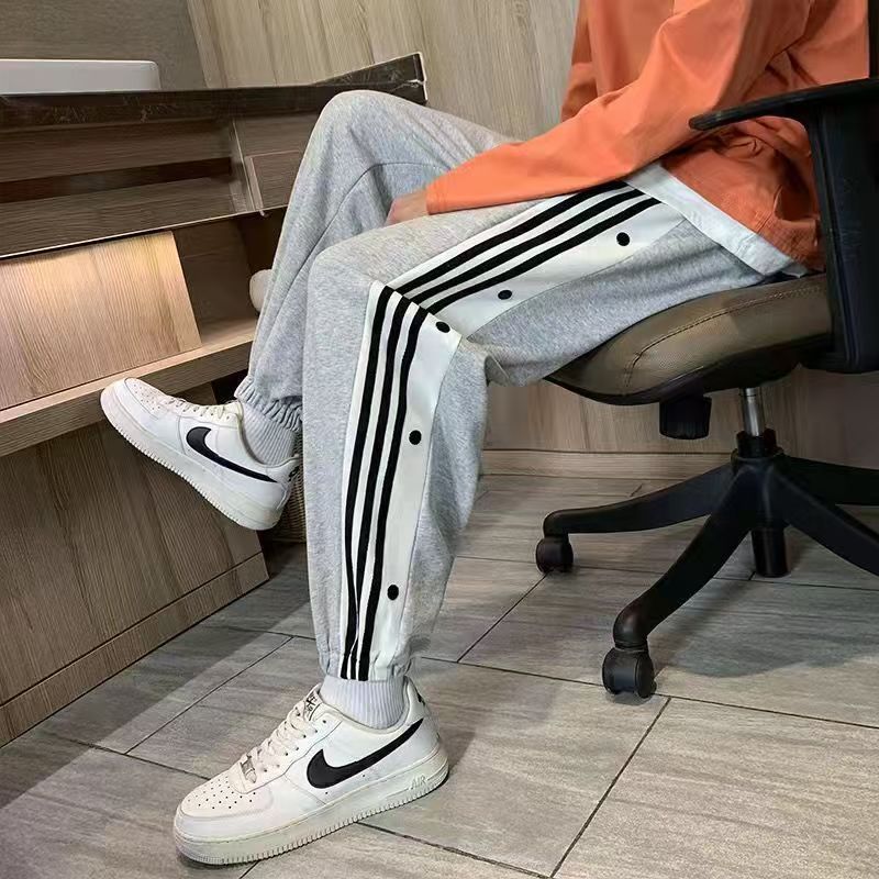 青少年大童排扣裤子春夏秋冬款加绒加厚学生潮流休闲束脚运动卫裤