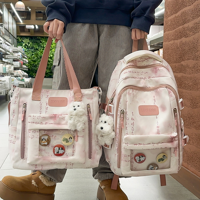 日系百搭高颜值书包女初中生扎染痛包小清新高中小学生减负双肩包