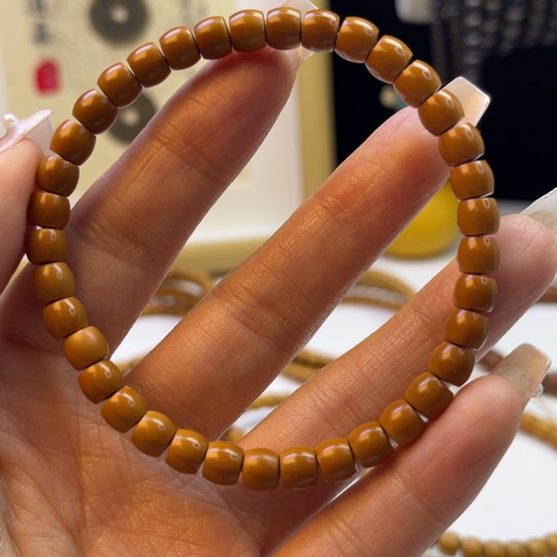 橄榄核手串?**师核尖单圈