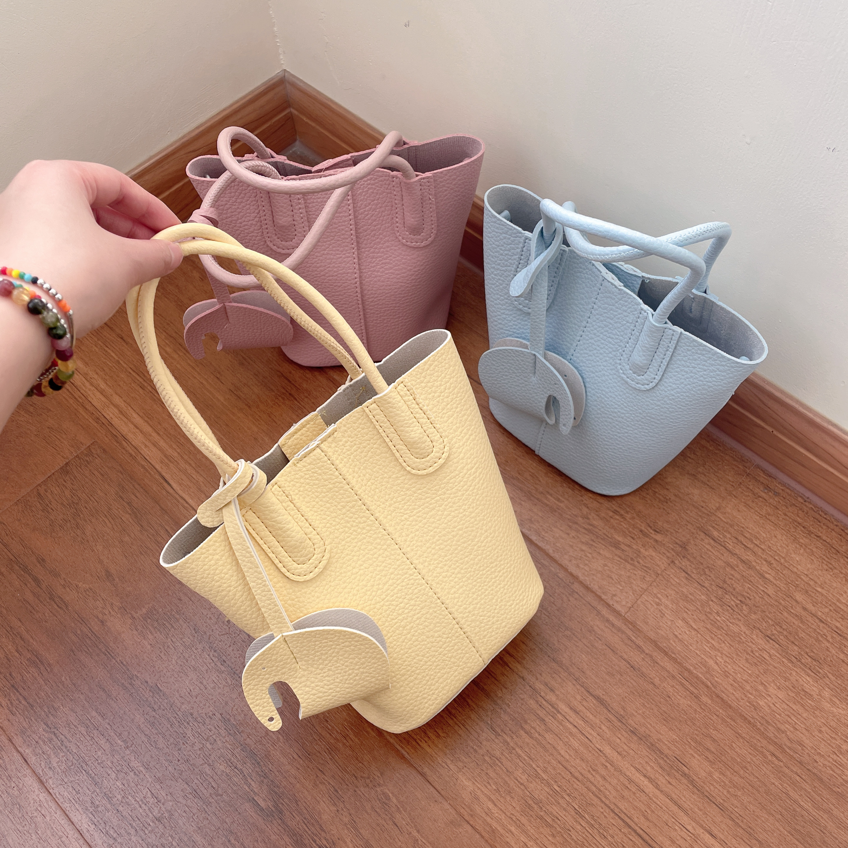 新款春季时尚手提水桶包百搭通勤单肩斜挎包包子母包