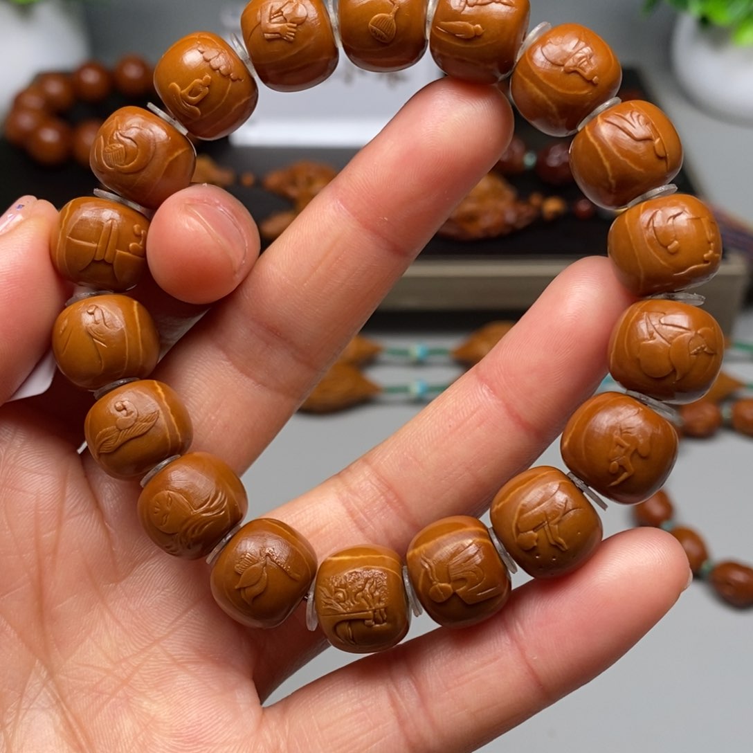 橄榄核吊坠观心手串