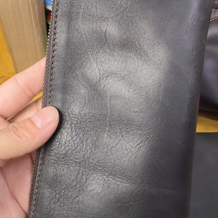 K***哥1真牛皮收纳手机包一个
