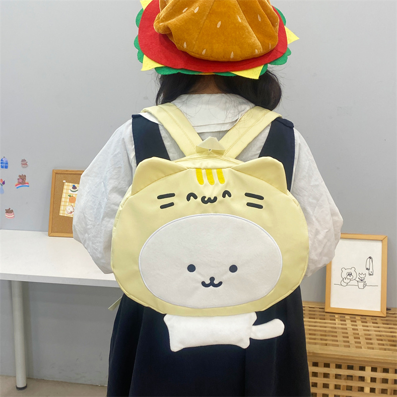 吉吉向上原创超萌可爱小猫头套白熊书包百搭学生软妹双肩包
