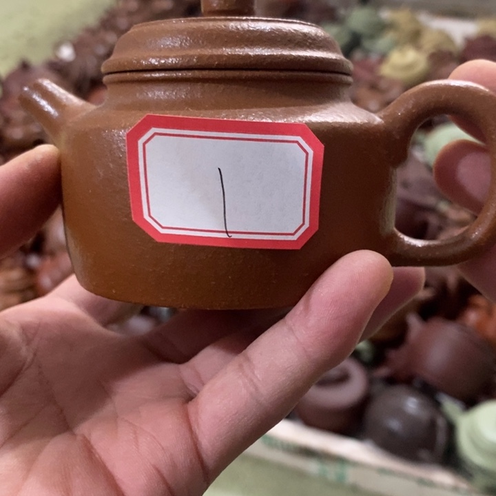 紫砂茶壶黄降坡得中