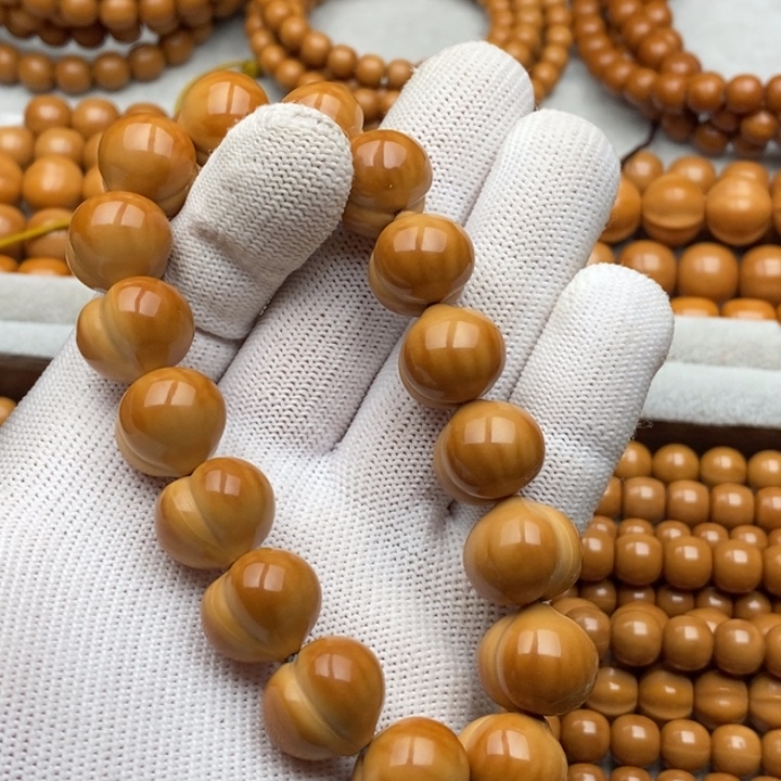 用***3猴头核桃手串屁桃