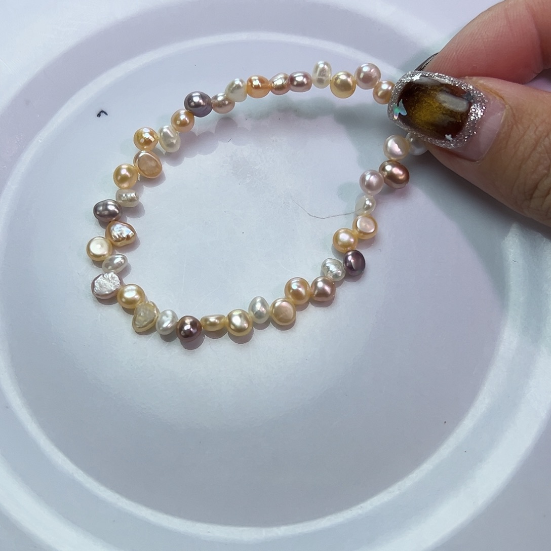 手绳淡水珍珠钛钢
