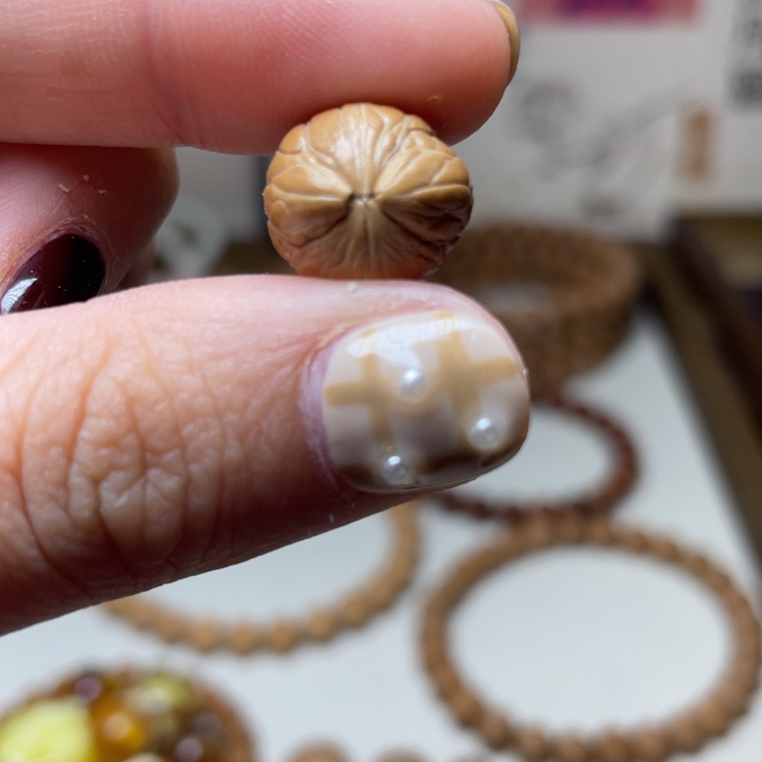 娜***泡猴头核桃吊坠凤羽双角