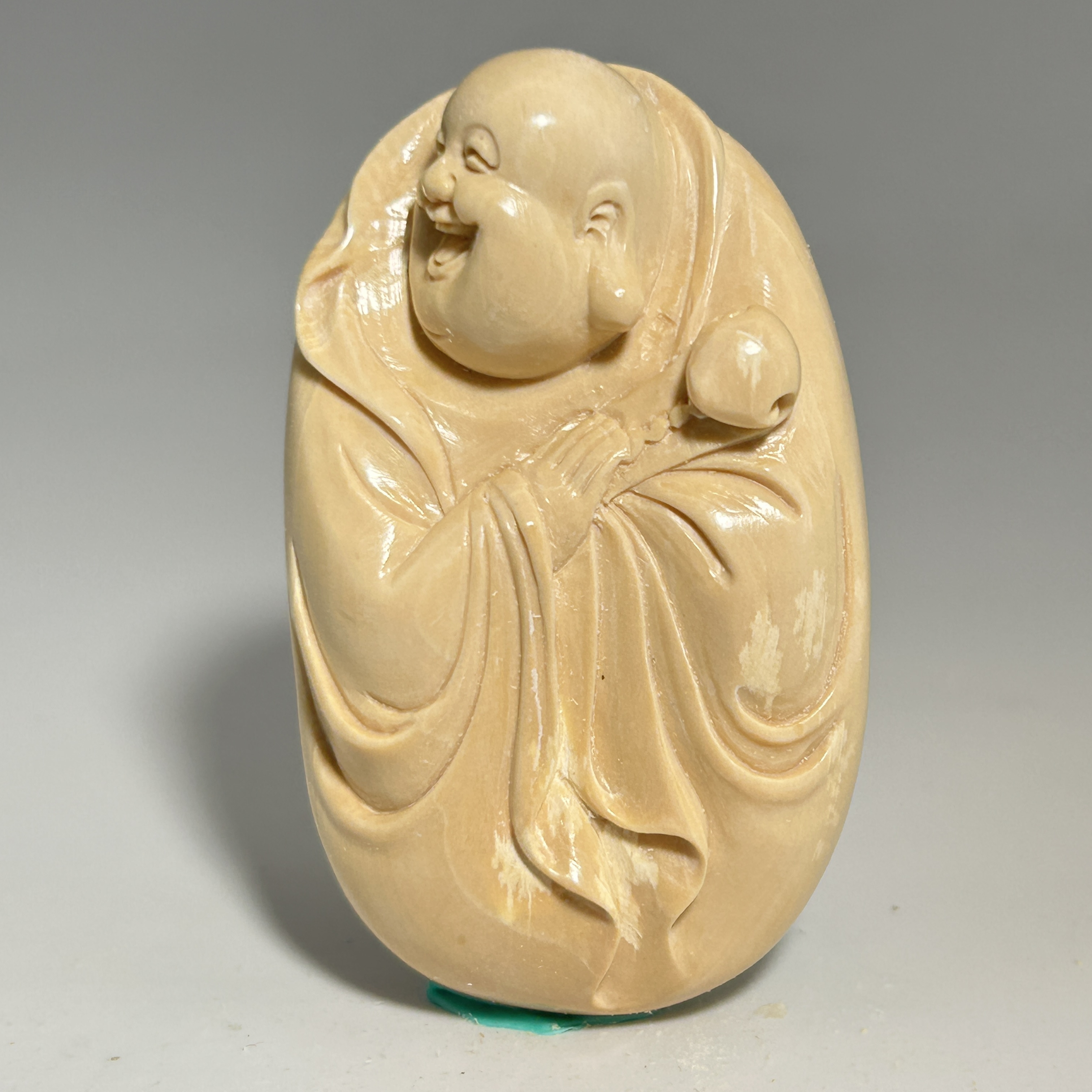 猛犸牙雕奶黄弥勒把件52*32*14mm假一罚四X1147