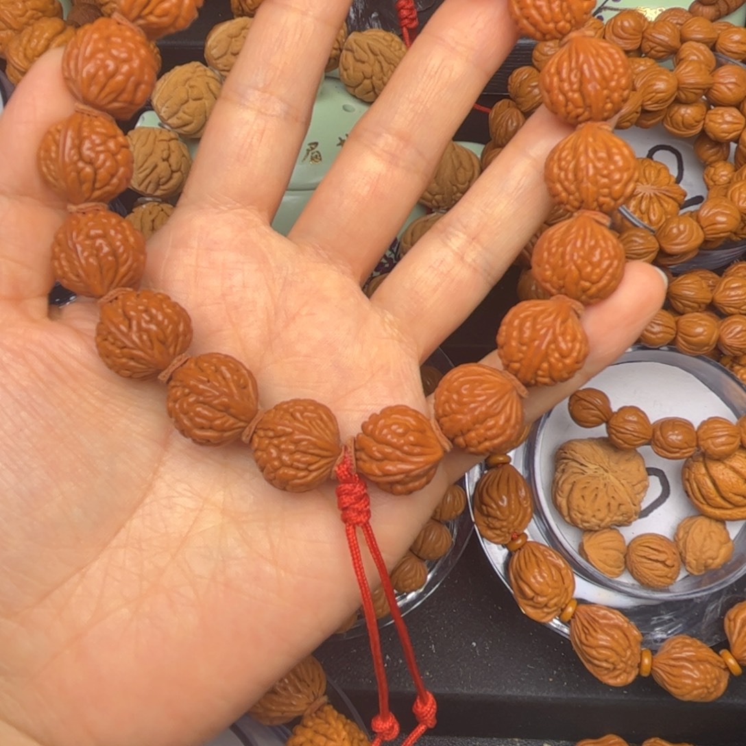 鑫***馆吊坠桃核龙纹桃核手串