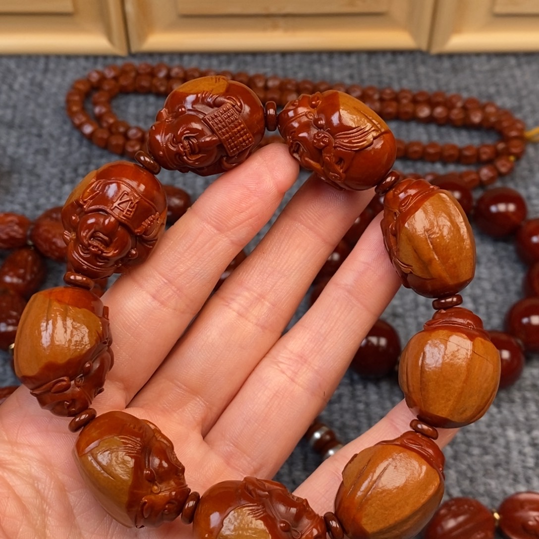 赵***特橄榄核手串/手链包衣财神