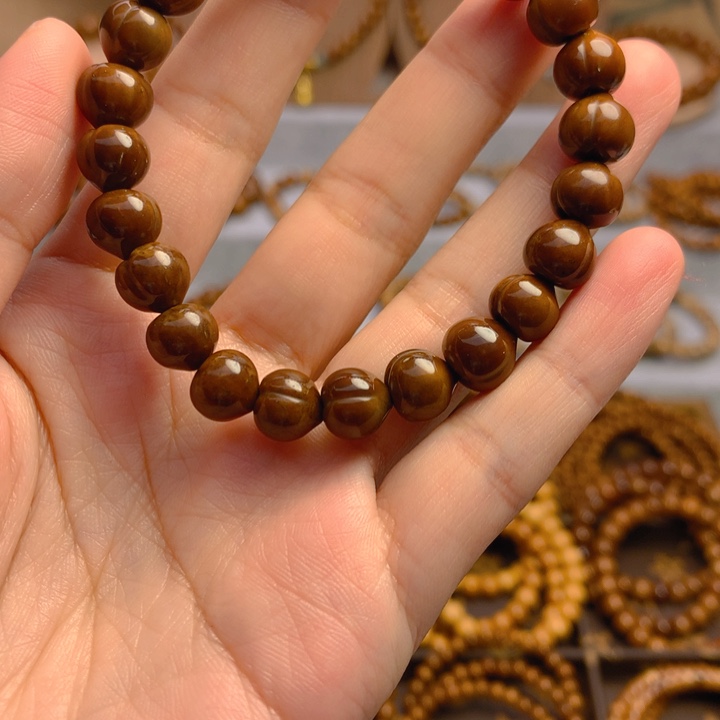 果皮天然库克精挑屁桃8*9单圈手串