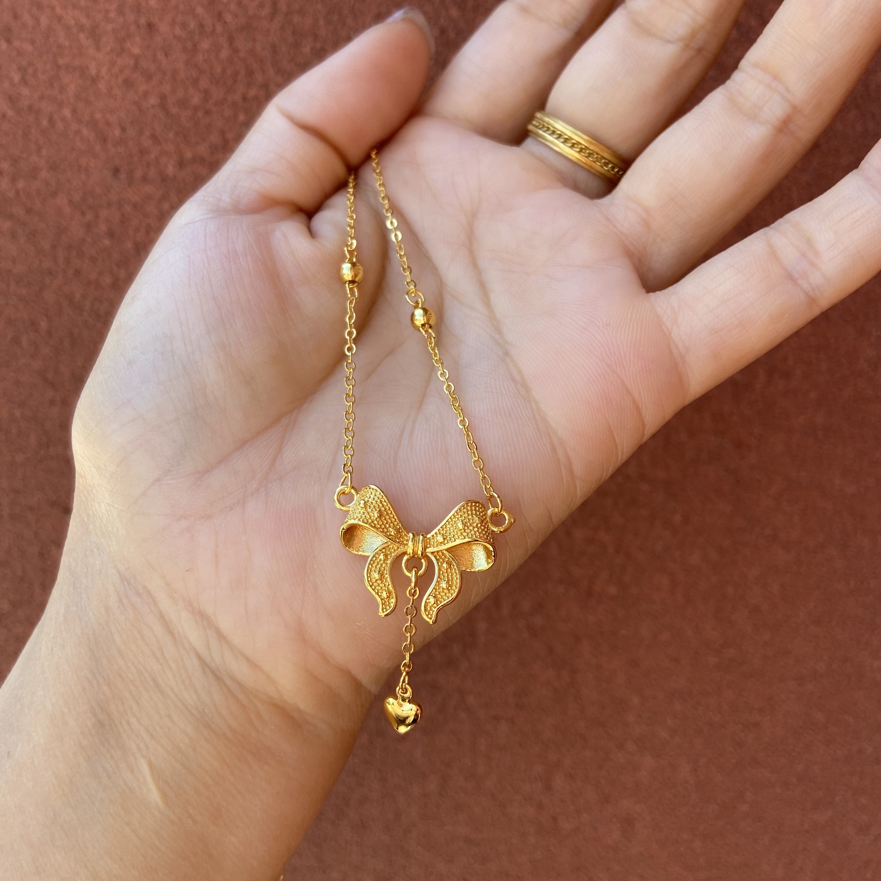 750-精工蝴蝶结项链