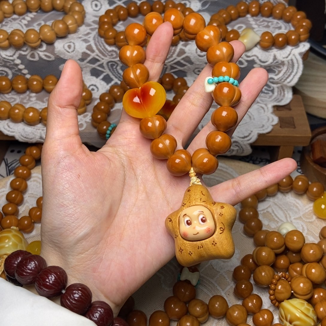 M****猴头核桃吊坠屁桃玻璃底卡15