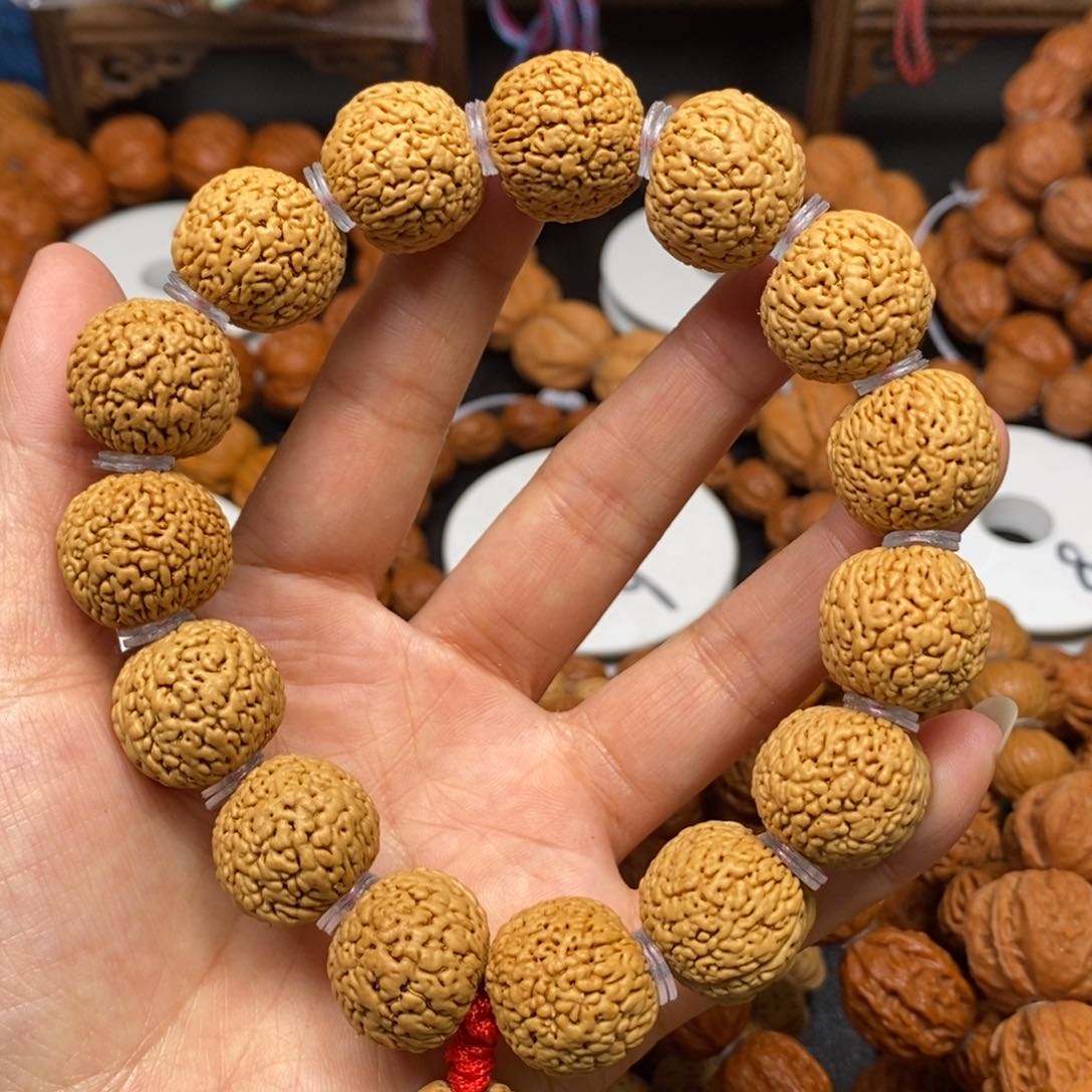 桃核手串龙鳞凤尾