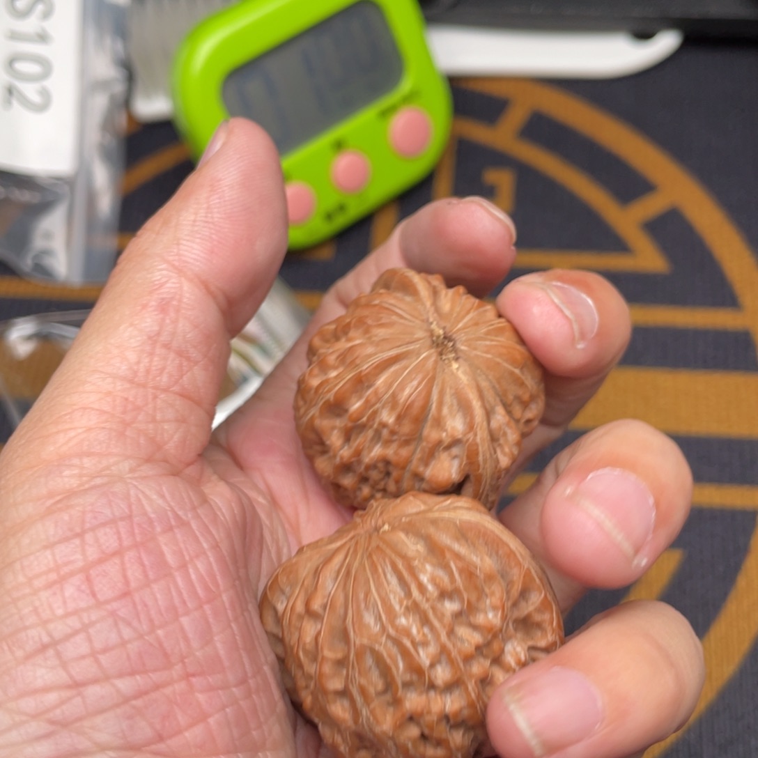 克***王文玩核桃吊坠铁锤