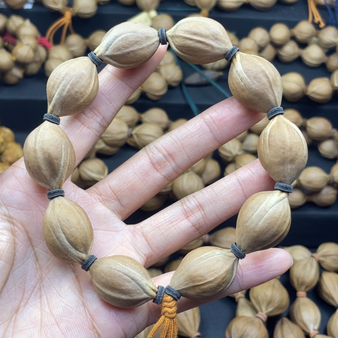 081橄榄核三花17*27